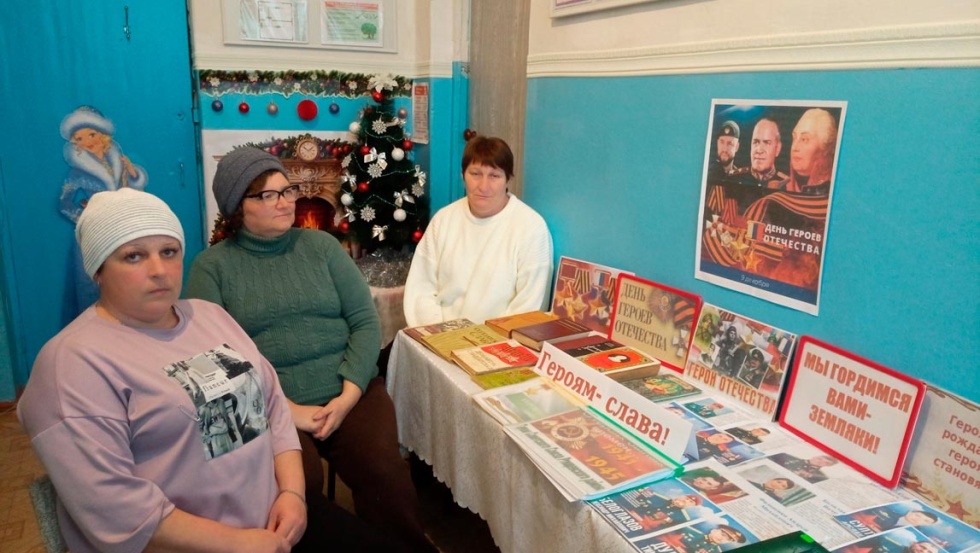 Живут герои в памяти народа