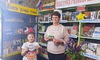 И двери распахнув библиотека в познанья путь читателя зовет